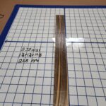 BLACK AND WHITE EBONY RISER BLOCK