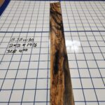 BLACK AND WHITE EBONY RISER BLOCK