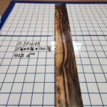 BLACK AND WHITE EBONY RISER BLOCK