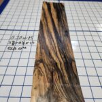 BLACK AND WHITE EBONY RISER BLOCK