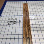 BLACK AND WHITE EBONY RISER BLOCK