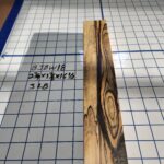 BLACK AND WHITE EBONY RISER BLOCK