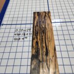 BLACK AND WHITE EBONY RISER BLOCK