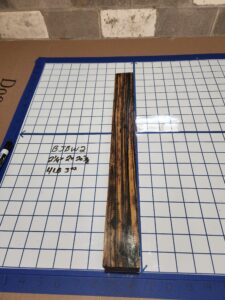 BLACK AND WHITE EBONY RISER BLOCK