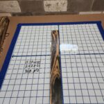 BLACK AND WHITE EBONY RISER BLOCK