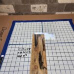 BLACK AND WHITE EBONY RISER BLOCK