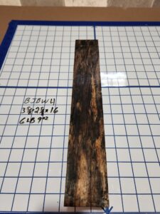 BLACK AND WHITE EBONY RISER BLOCK