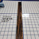 BLACK AND WHITE EBONY RISER BLOCK