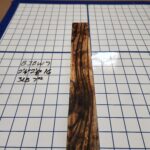 BLACK AND WHITE EBONY RISER BLOCK